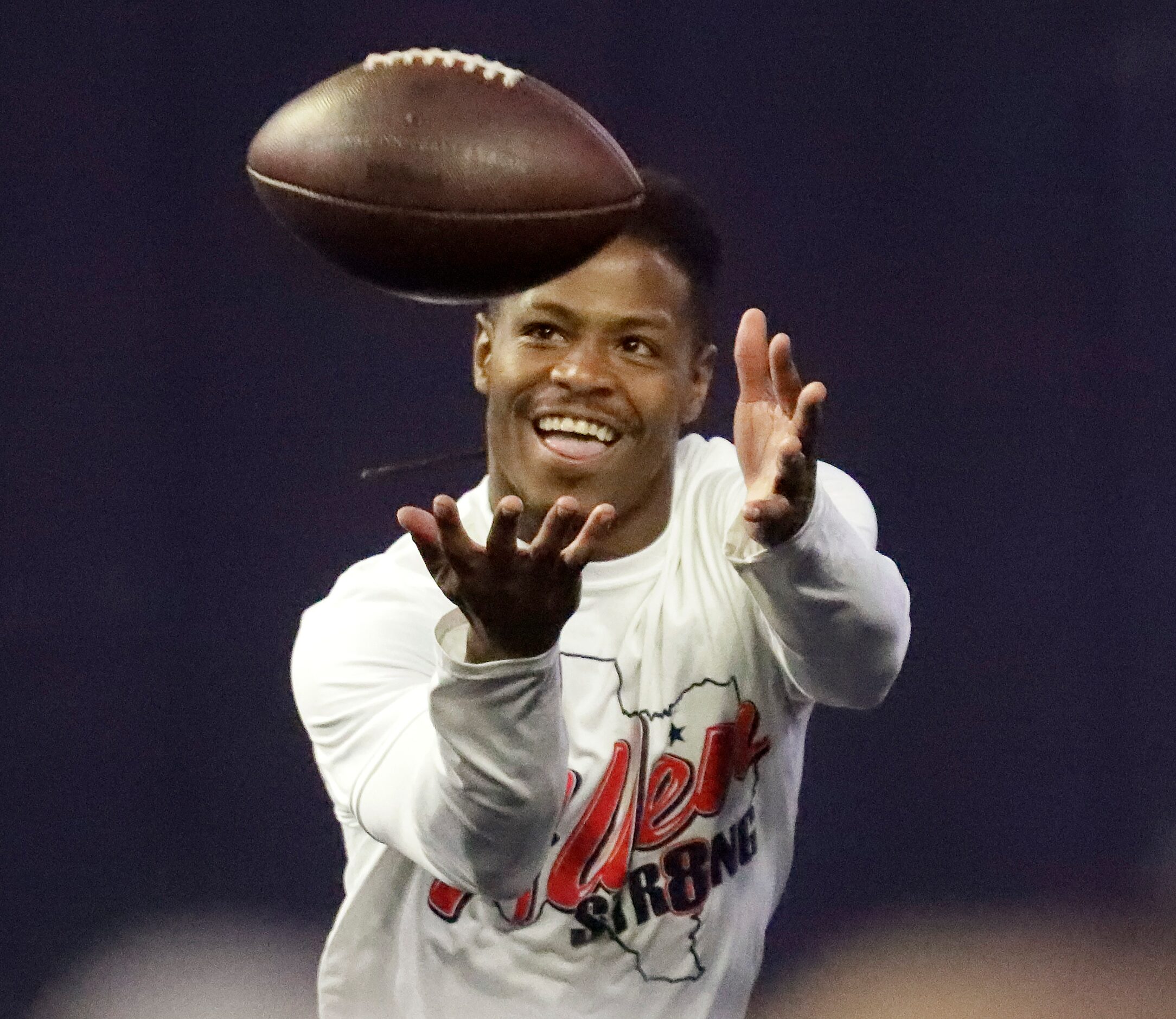 Wide receiver KaVontae Turpin catches a pass during a drill as the Dallas Cowboys held mini...