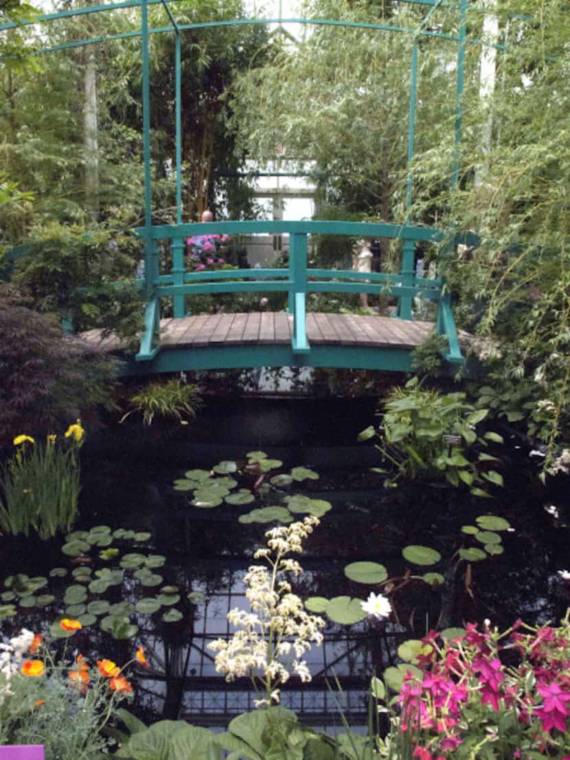 A replica of a bridge on the property of artist Claude Monet is featured in an exhibition at...