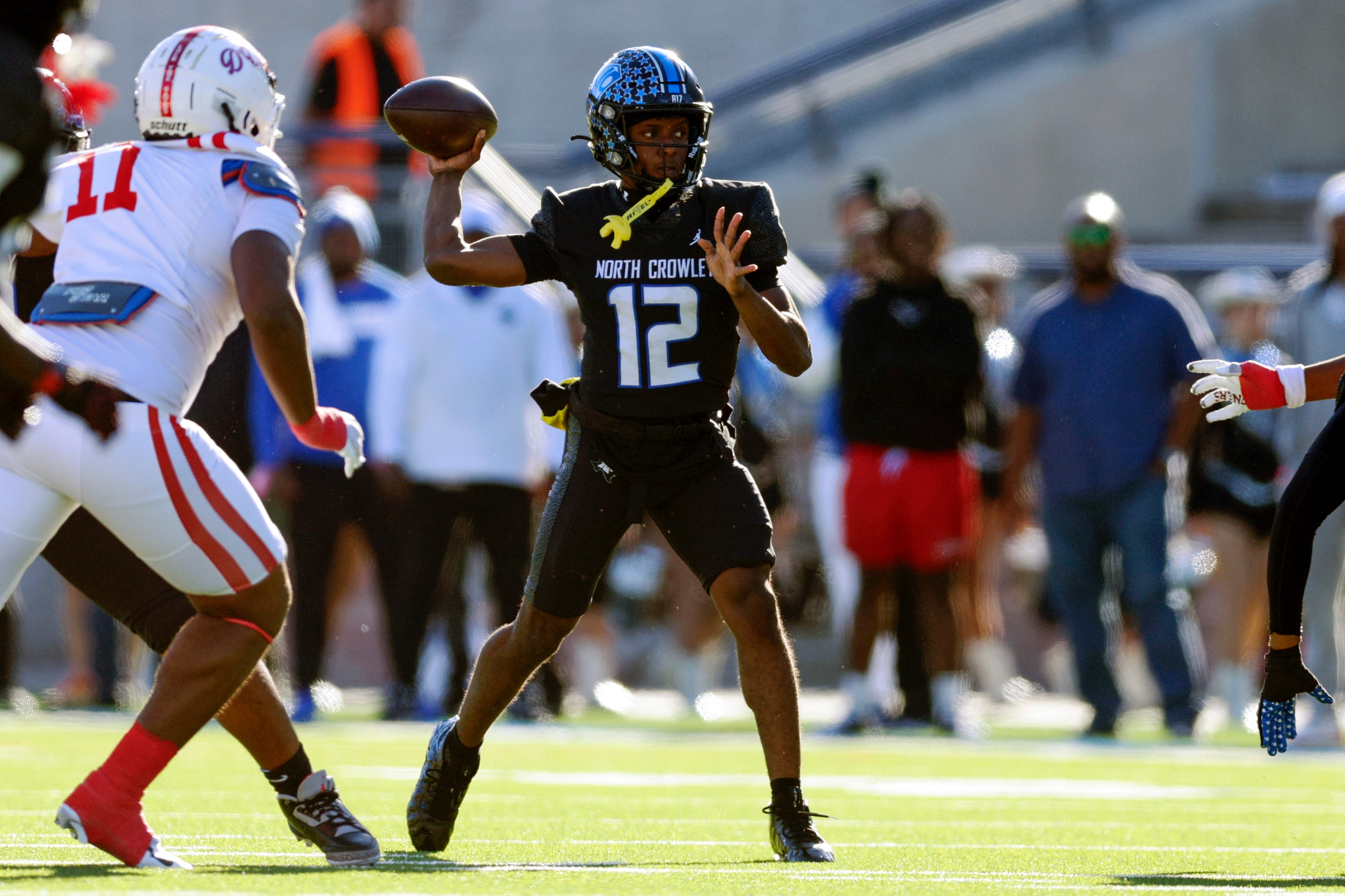 North Crowley quarterback Chris Jimerson Jr. (12) throws a pass during the first half of a...