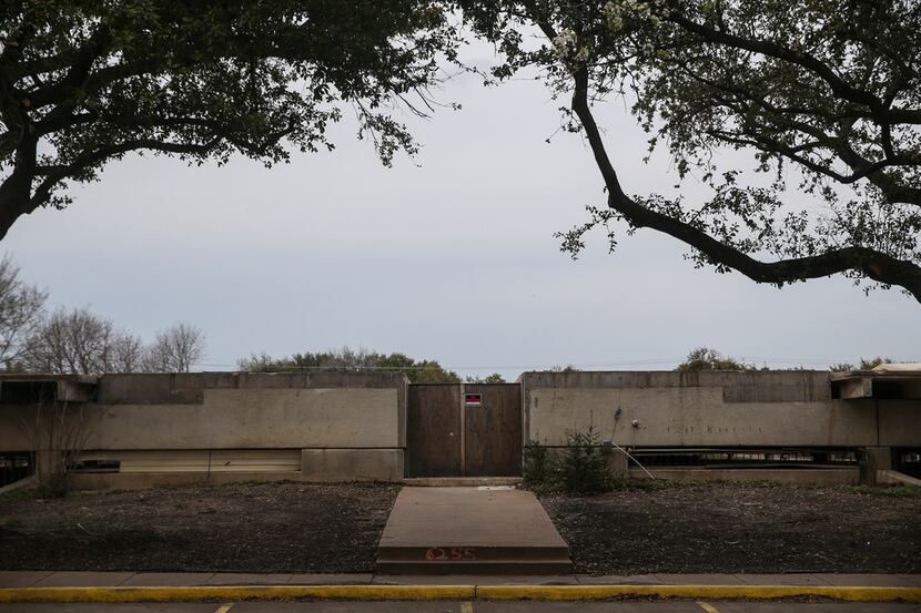 A concrete slab, all that remains of Preston Place Condominiums, which was destroyed by a...