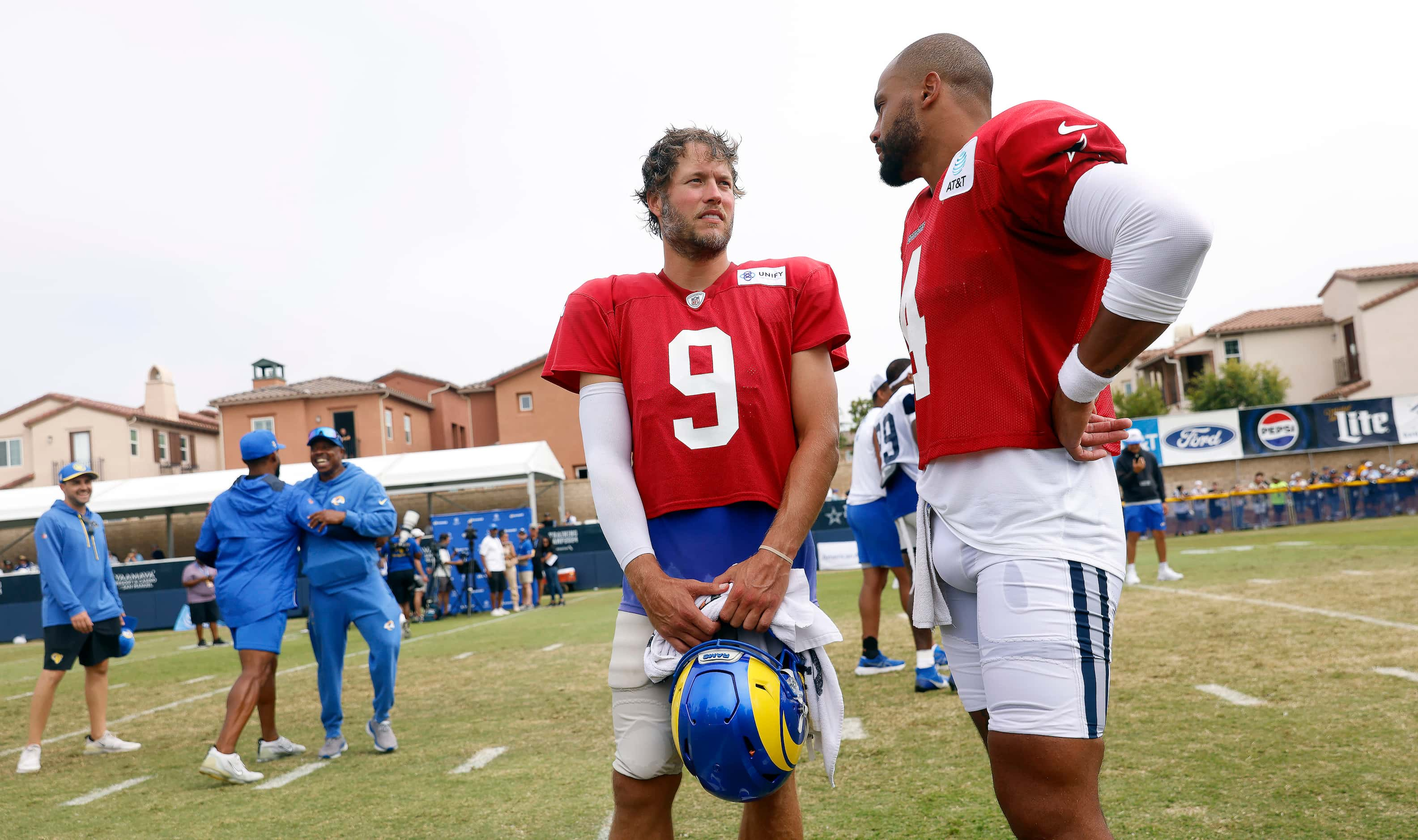 Dallas Cowboys quarterback Dak Prescott (4) and Los Angeles Rams quarterback Matthew...