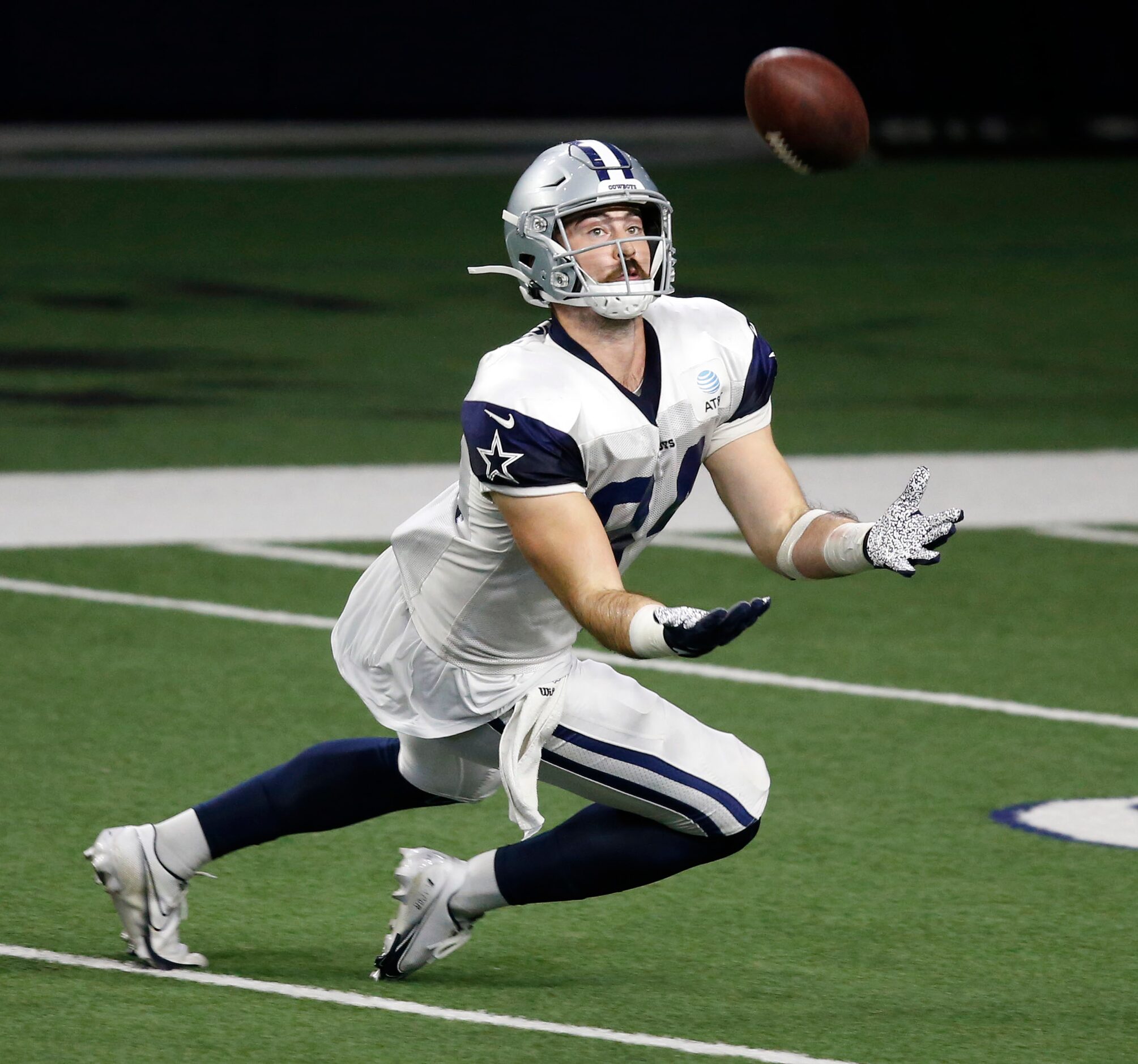 Dallas Cowboys tight end Sean McKeon (84) prepares to catch a pass on a play during training...