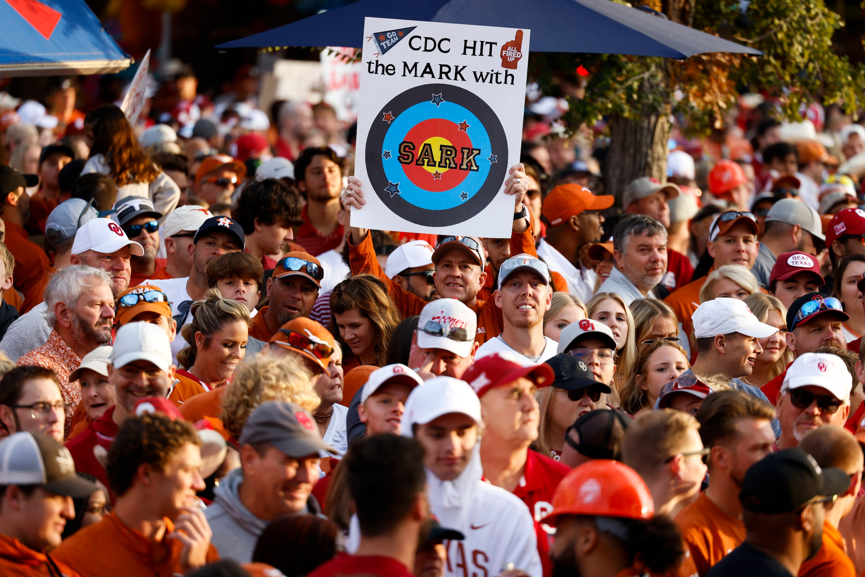 Fans gather ahead of the Red River Showdown outside of the Cotton Bowl for ESPN Game Day, on...