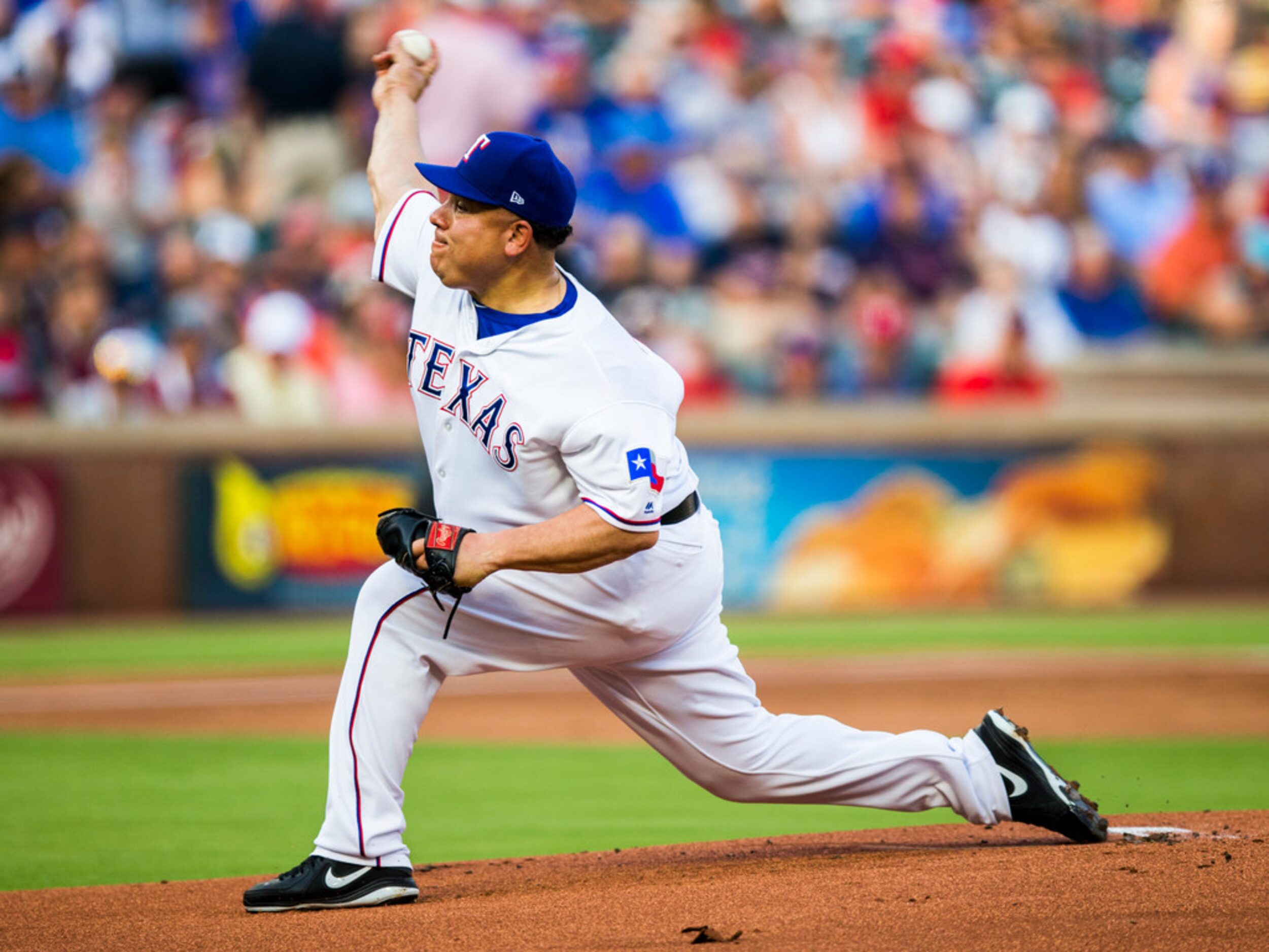 /t40 pitches during the first inning of an MLB game between the Texas Rangers and the...