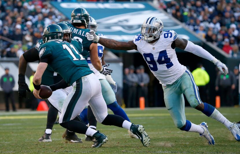 Dallas Cowboys defensive end Randy Gregory (94) chases Philadelphia Eagles quarterback...