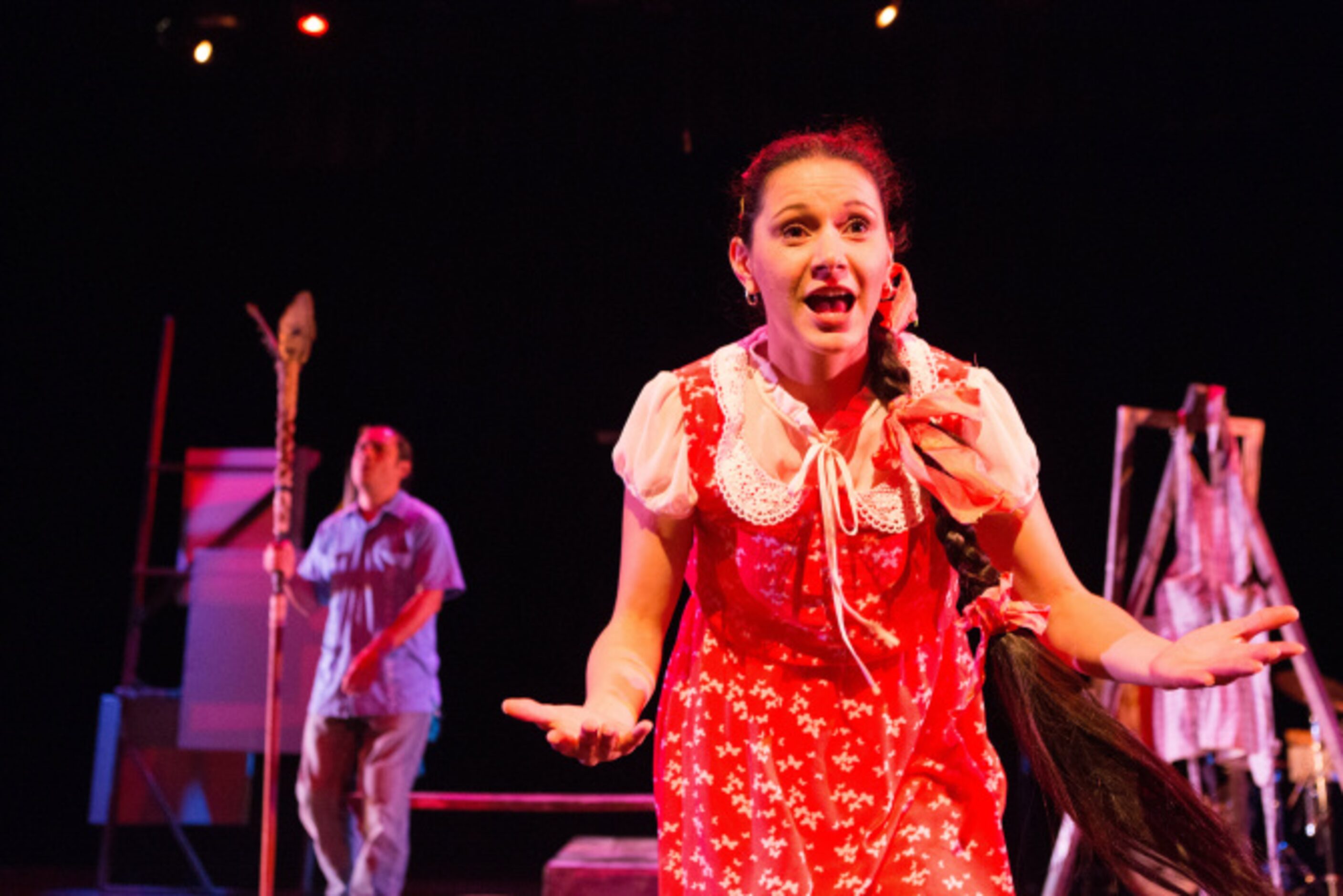 Frida Espinosa-Muller of the Cara Mia Theatre Company sings and dances during a performance...