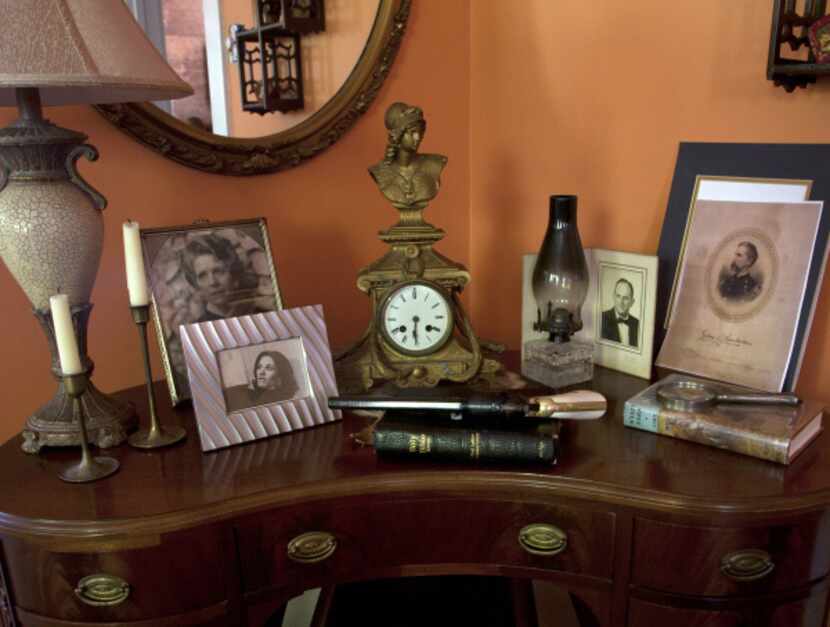 Of the four photos on the antique desk, three are Worley’s: her grandmother, mother and...