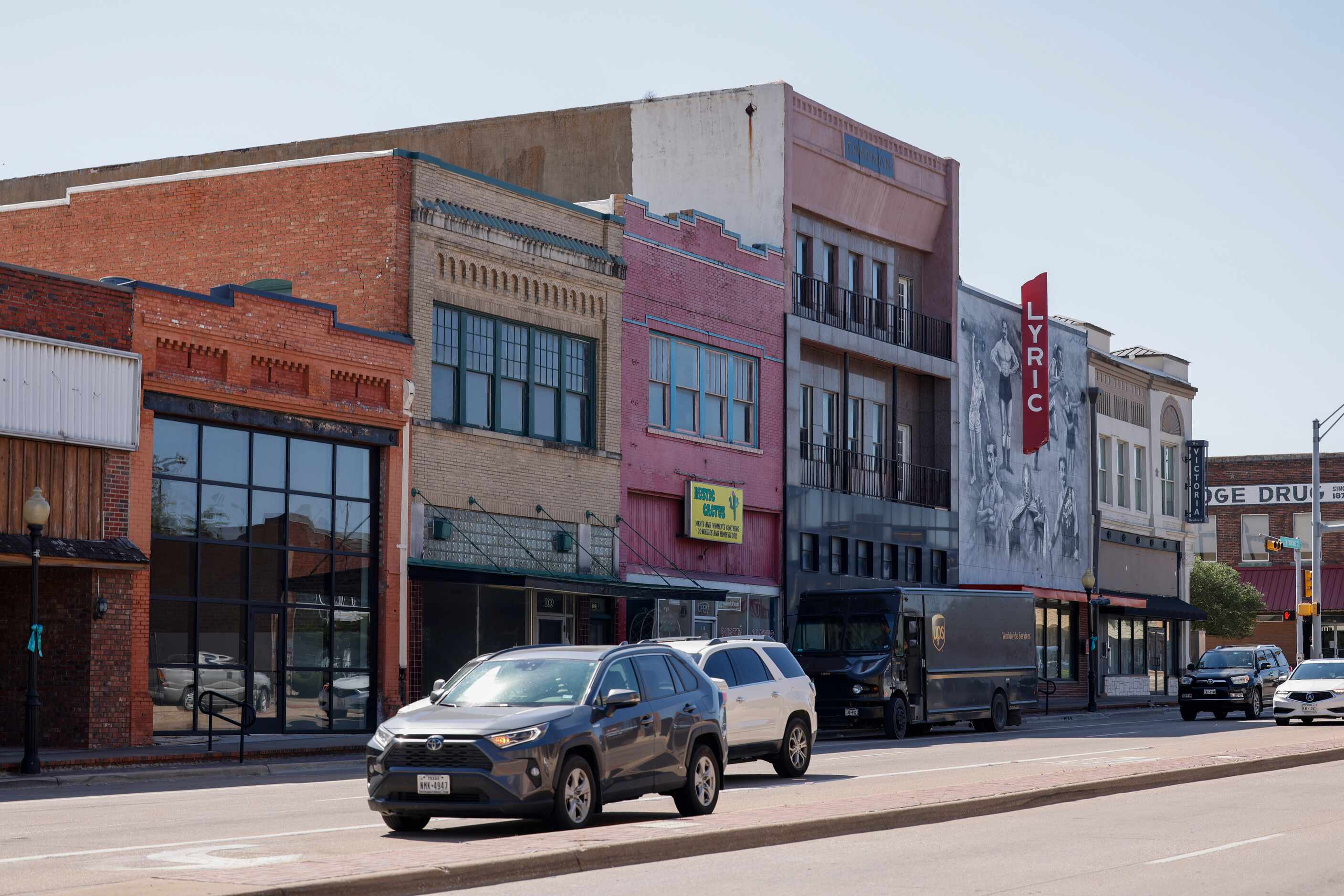 Cars drive along East Moore Avenue in downtown Terrell on Sept. 28.