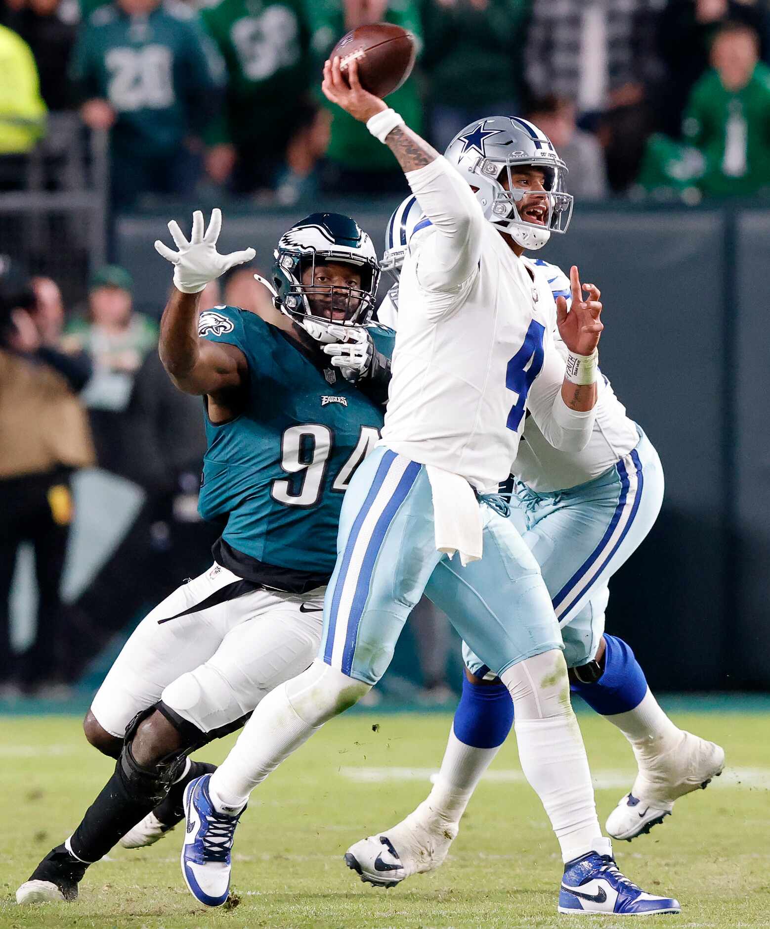 Dallas Cowboys quarterback Dak Prescott (4) releases a third quarter pass as Philadelphia...