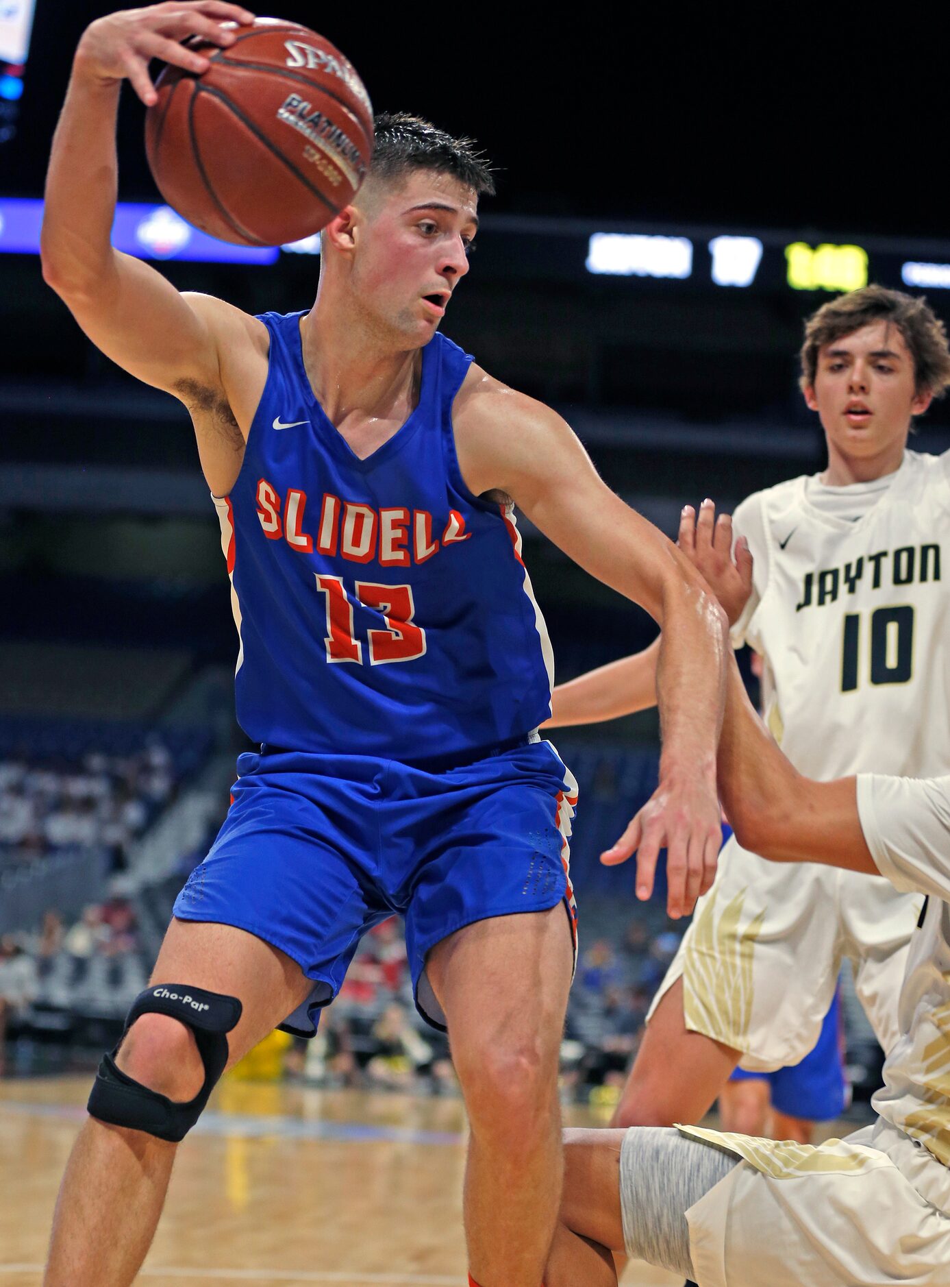 Slidell center Slayton Pruett #13 grabs a rebound. Slidell defeated Jayton 45-28 in a Class...