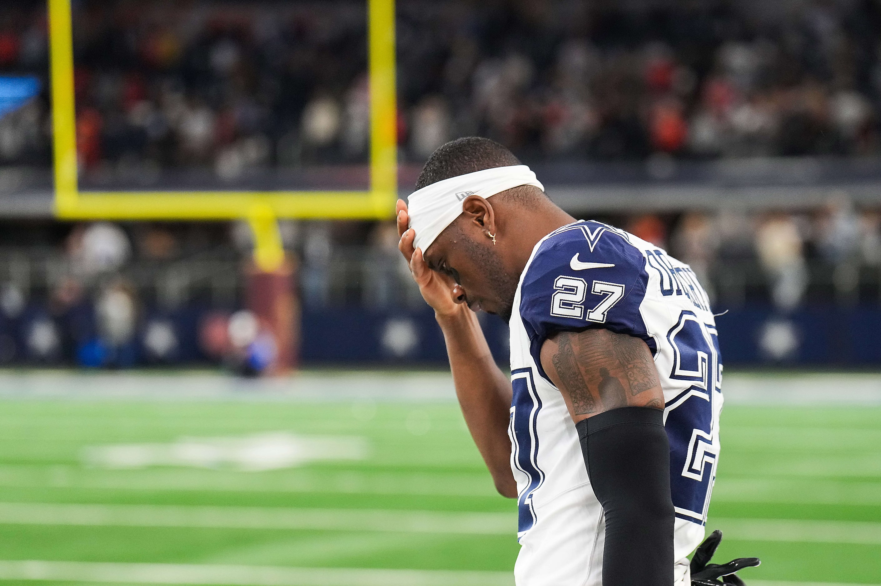 Dallas Cowboys cornerback Amani Oruwariye reacts on the sidelines after a loss to the...