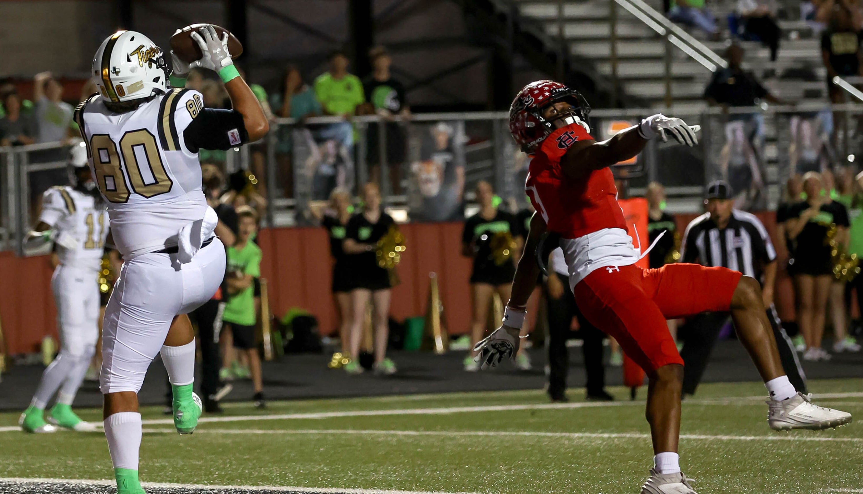 Mansfield tight end Dylan Prescott (80) comes up with a touchdown reception against Cedar...