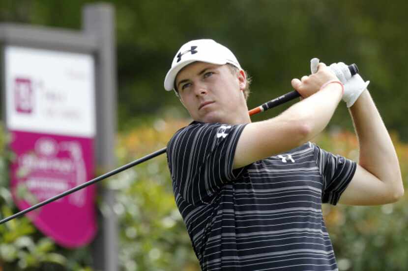 Jordan Spieth tees off on the 15th tee during the third round of the Crowne Plaza...