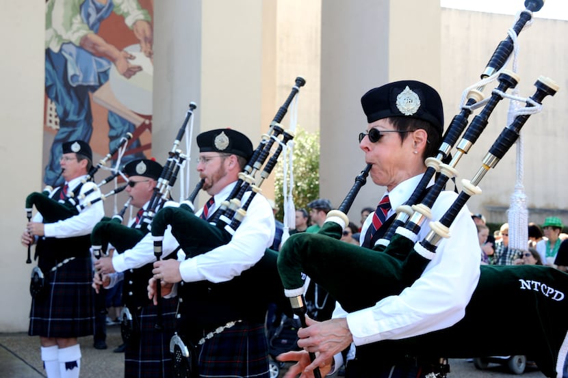 The North Texas Caledonian Pipes and Drums perform at the North Texas Irish Festival in Fair...
