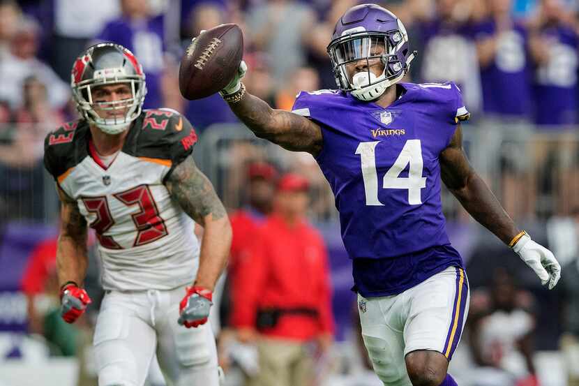 Minnesota Vikings wide receiver Stefon Diggs celebrates after catching a 17-yard touchdown...