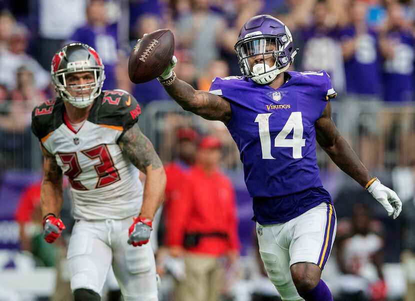 Minnesota Vikings wide receiver Stefon Diggs celebrates after catching a 17-yard touchdown...