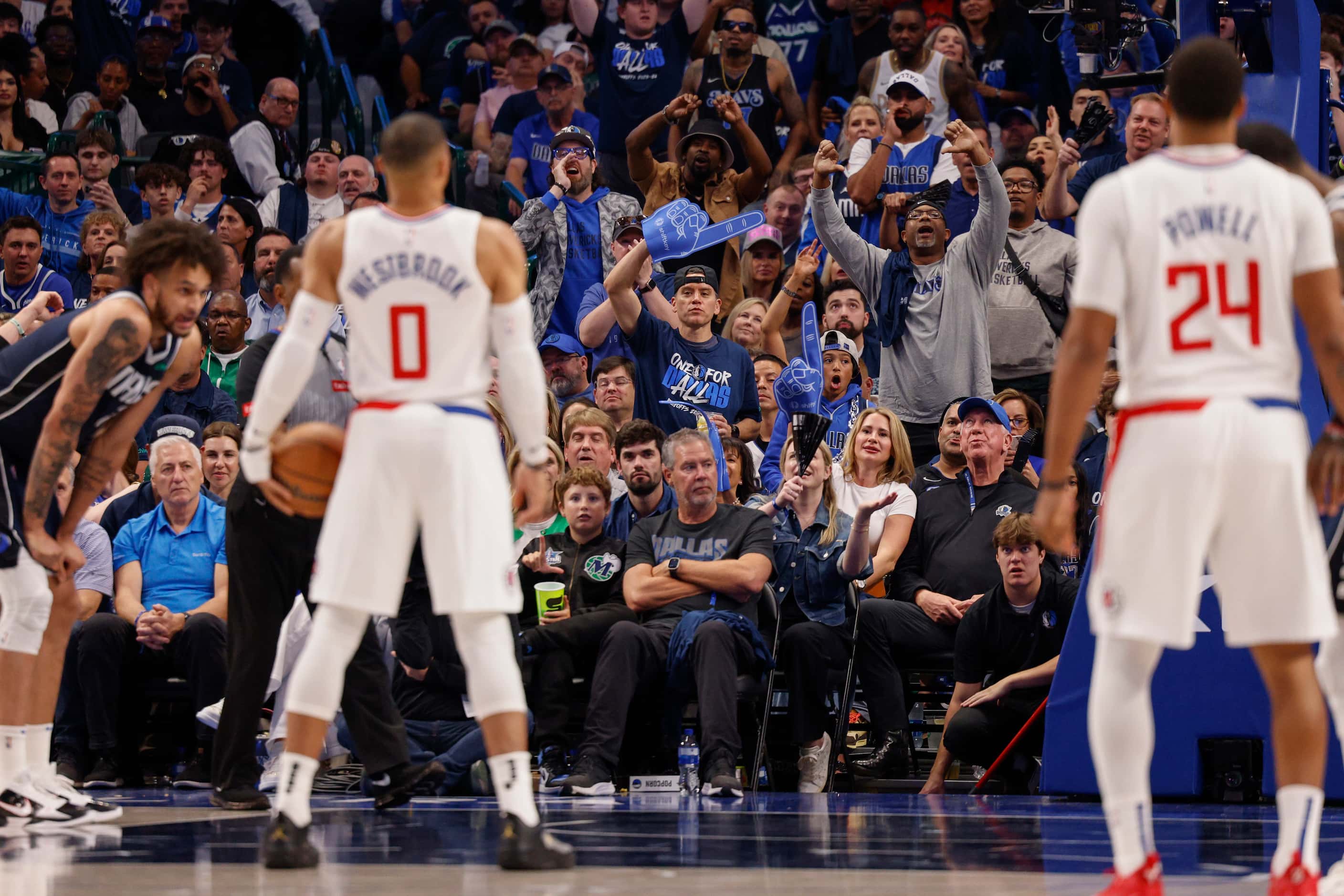 Fans boo LA Clippers guard Russell Westbrook (0) as he shoots a free throw during the second...