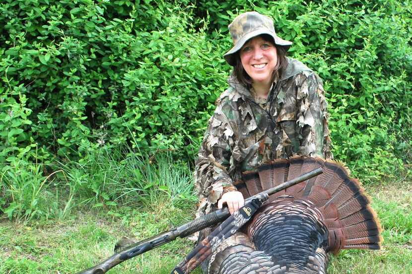 Monica Bickerstaff, with a Kansas spring turkey from 2012, began hunting to spend more time...