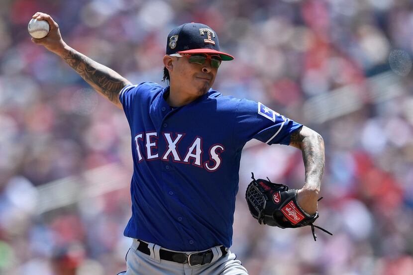 MINNEAPOLIS, MN - JULY 06: Jesse Chavez #53 of the Texas Rangers delivers a pitch against...