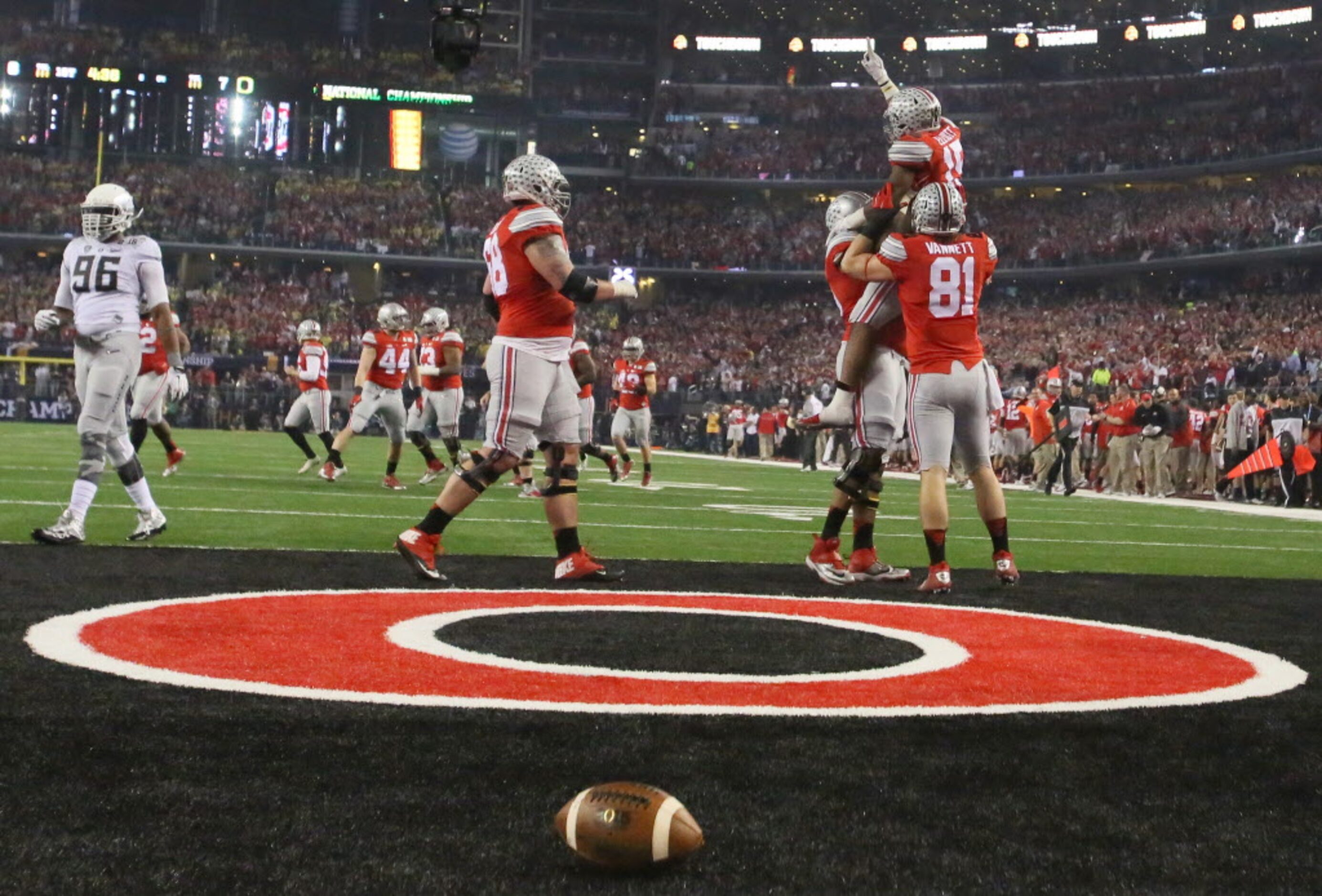 Teammates celebrate a Buckeyes touchdown with running back Ezekiel Elliott (15) during the...