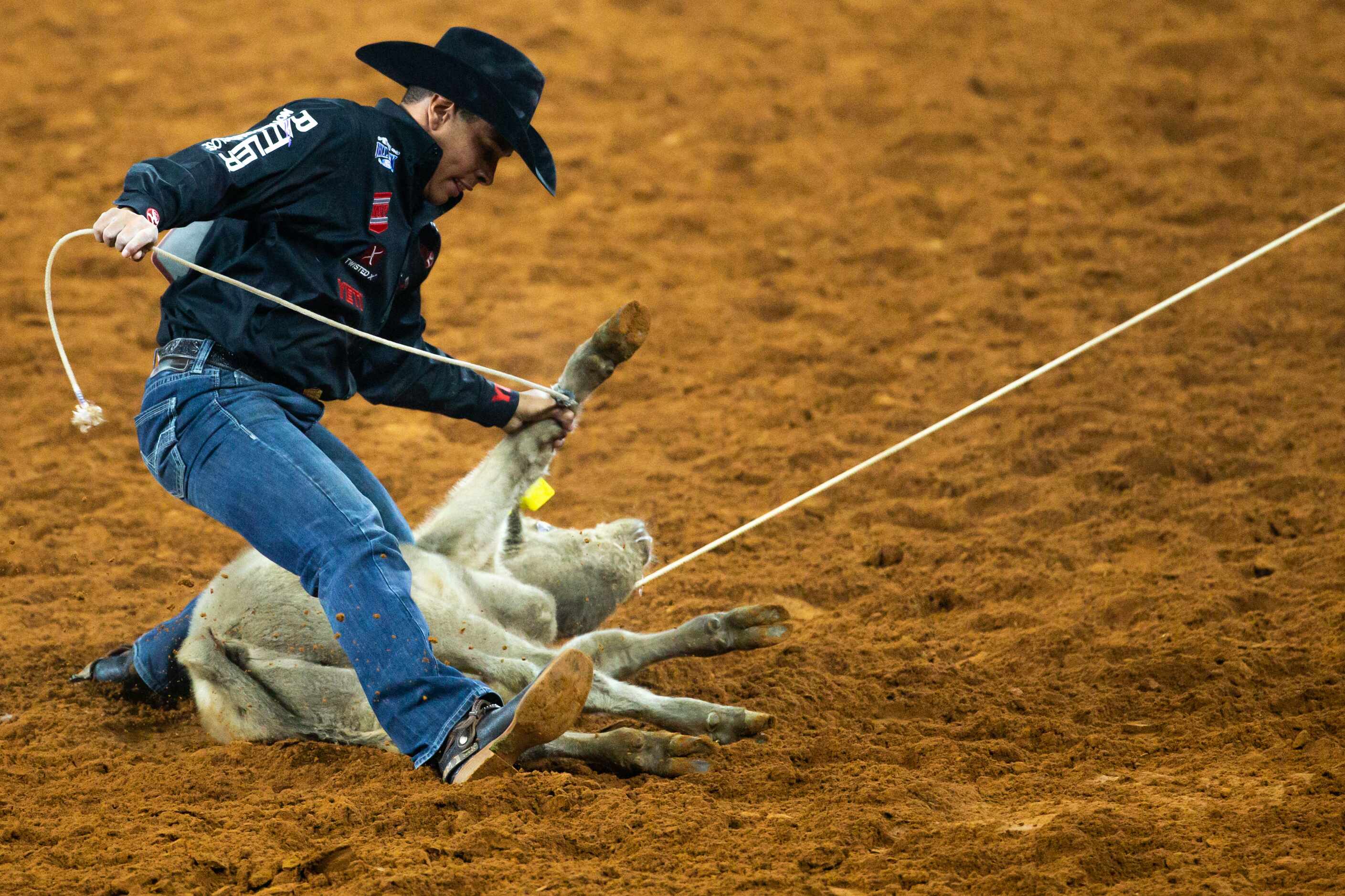 PRCA Tie Down Roping contestant Shad Mayfield earns second place in the first round of his...