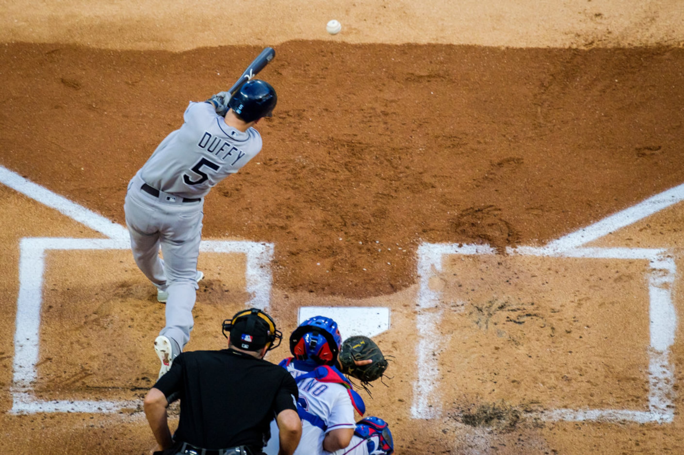 Tampa Bay Rays third baseman Matt Duffy drives in a run with a single during the first...