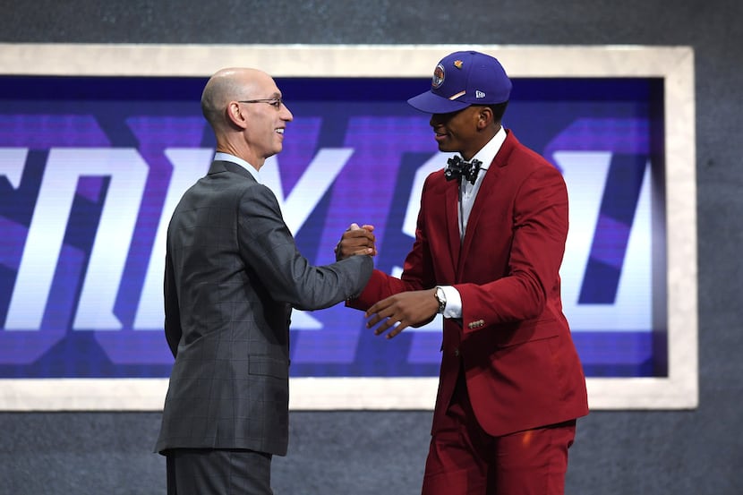 NEW YORK, NEW YORK - JUNE 20: Jarrett Culver poses with NBA Commissioner Adam Silver after...