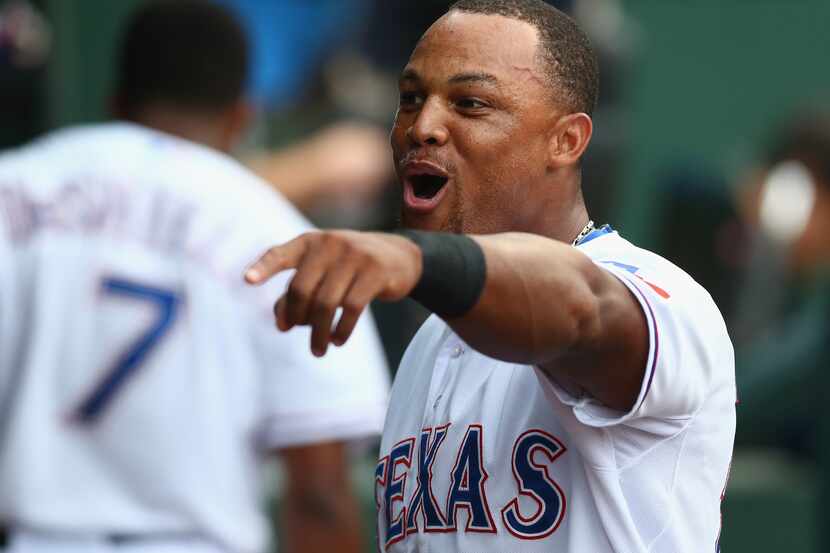 ARLINGTON, TX - MAY 15: Adrian Beltre #29 of the Texas Rangers celebrates in the dugout...
