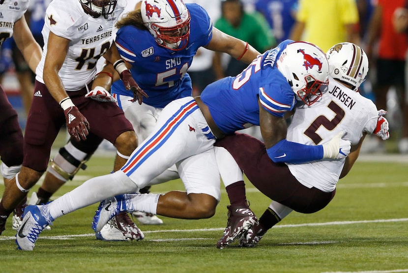 Southern Methodist Mustangs defensive end Delontae Scott (35) sacks Texas State Bobcats...