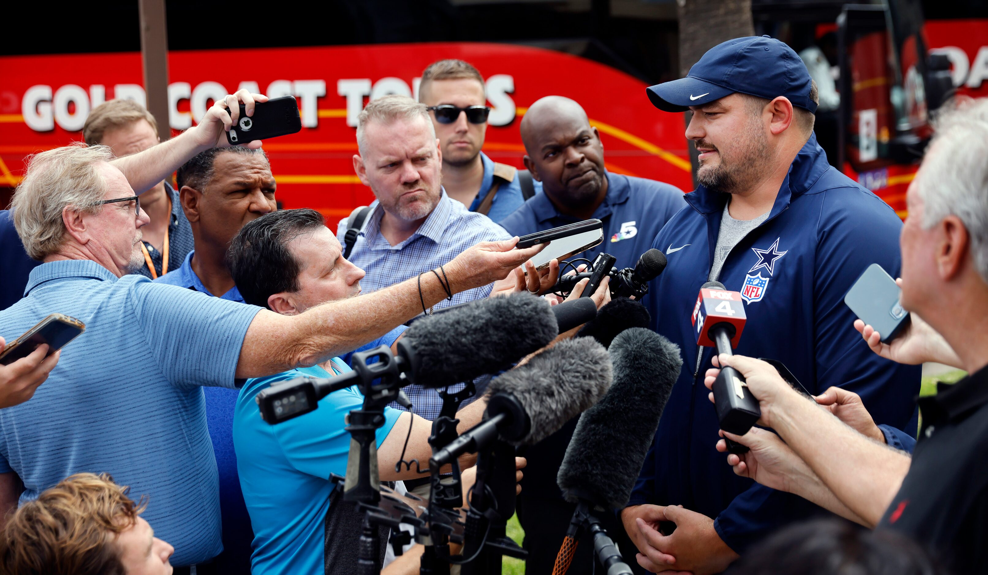 Dallas Cowboys guard Zack Martin answers questions from sports reporters after arriving to...