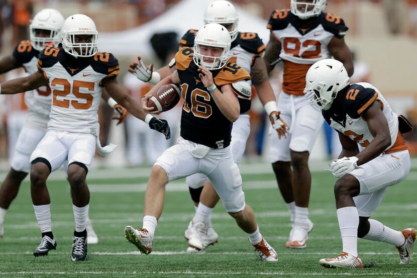 Texas quarterback Shane Buechele (16) scrambles for yards during a spring NCAA college...