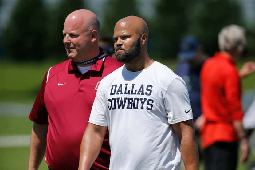 Kris Richard (center), new secondary coach during the Dallas Cowboys rookie minicamp at the...