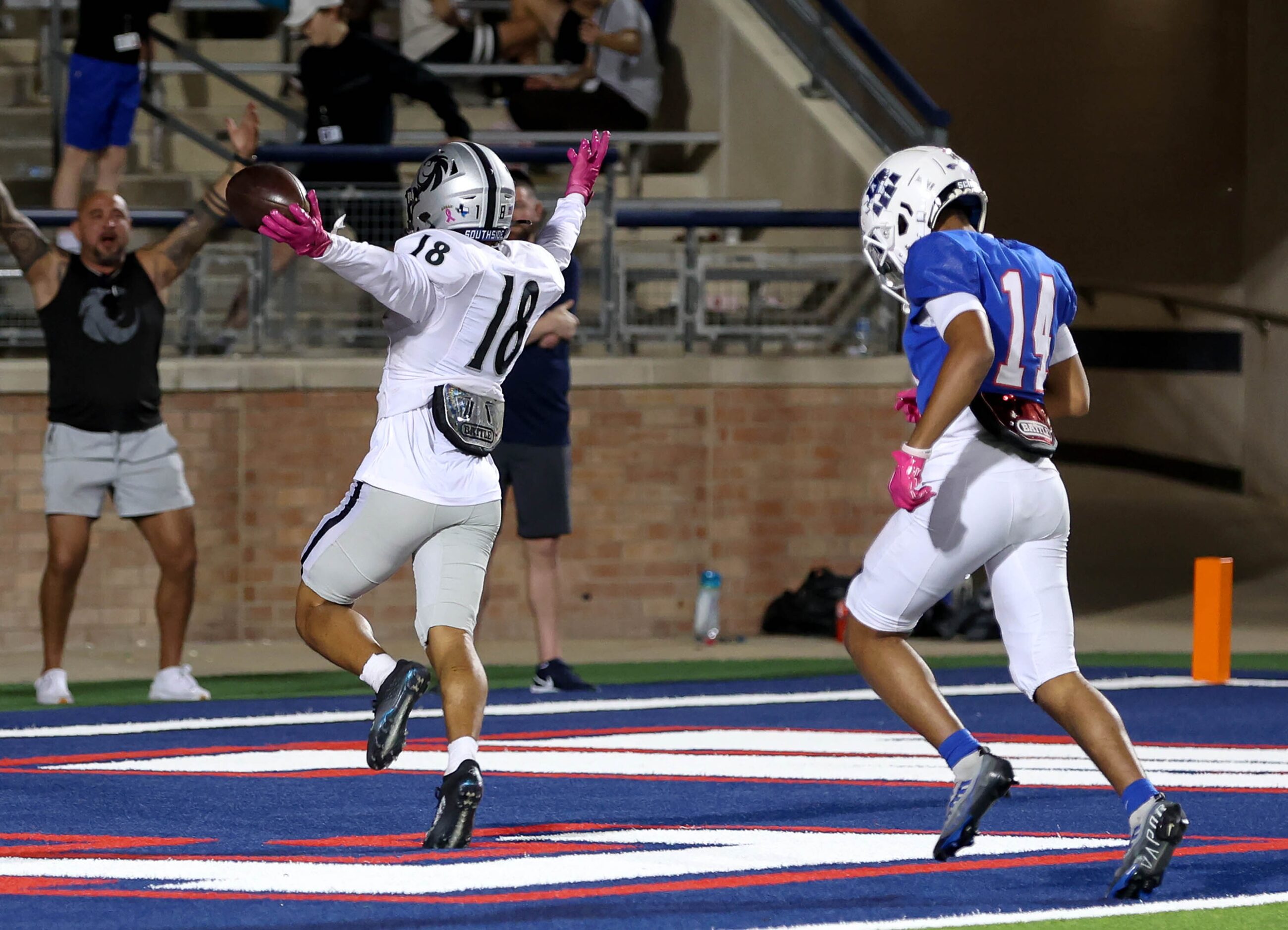 Denton Guyer punt returner Eli Bowen (18) gets in the end zone for a punt return touchdown...