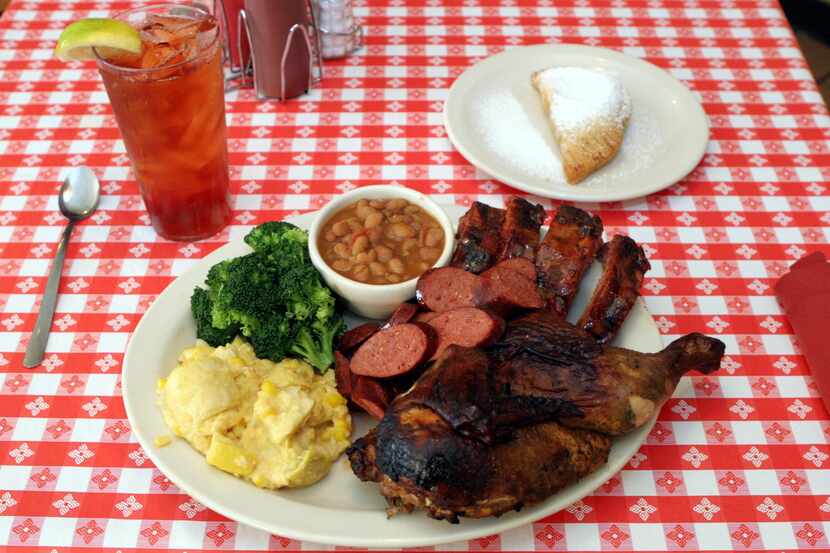 At Peggy Sue BBQ, some of the most popular items were baby back ribs and a half of a...