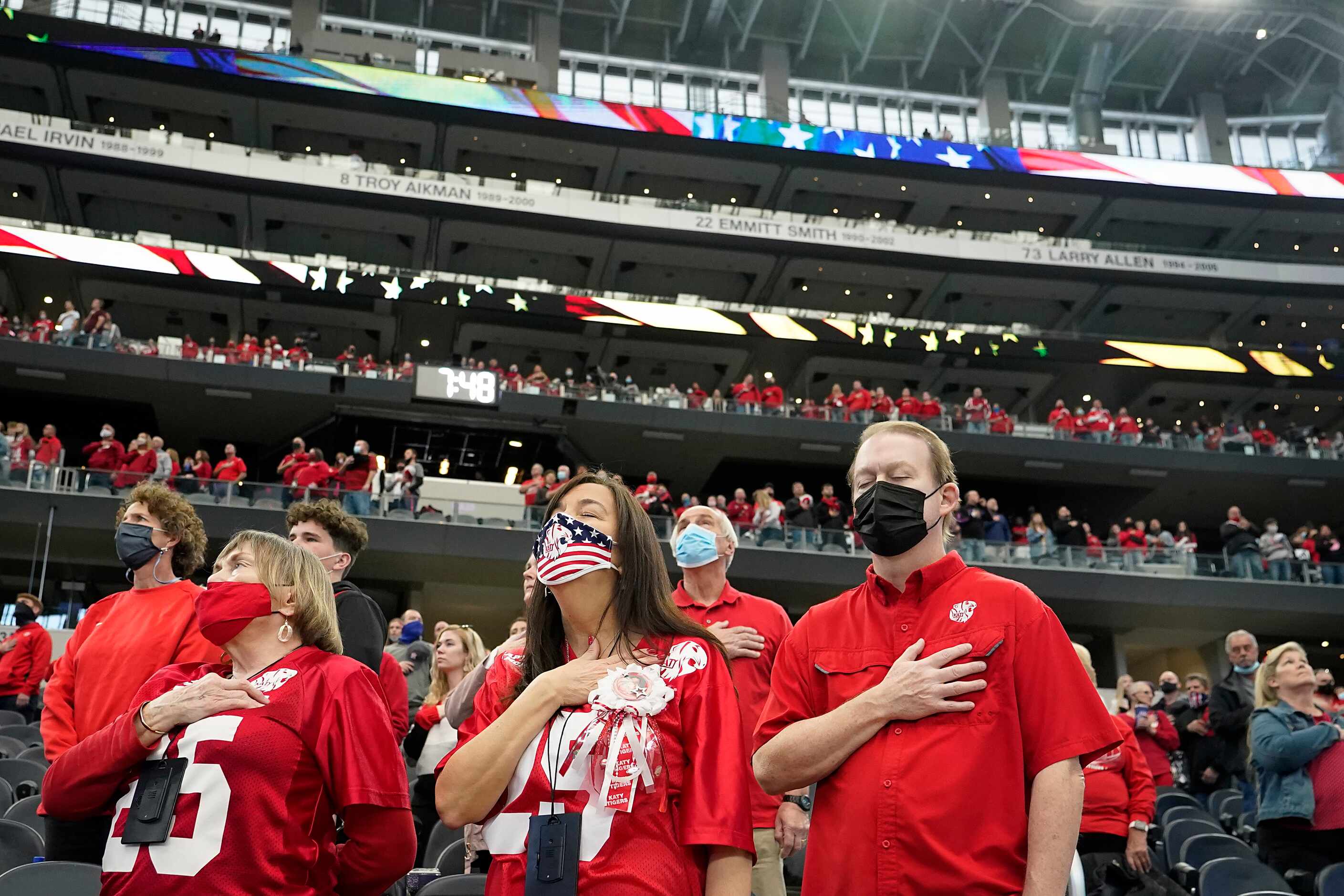 Katy fan stand for the national anthem before the Class 6A Division II state football...