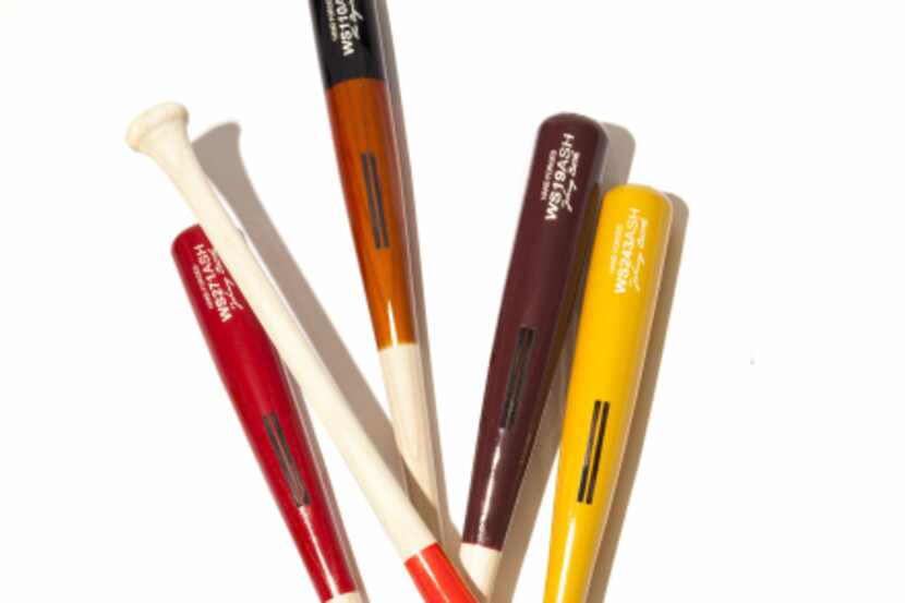 Warstic Wood Bat Co. ash Half Dips, $79 each, and limited-edition War Buffalo in ash with...