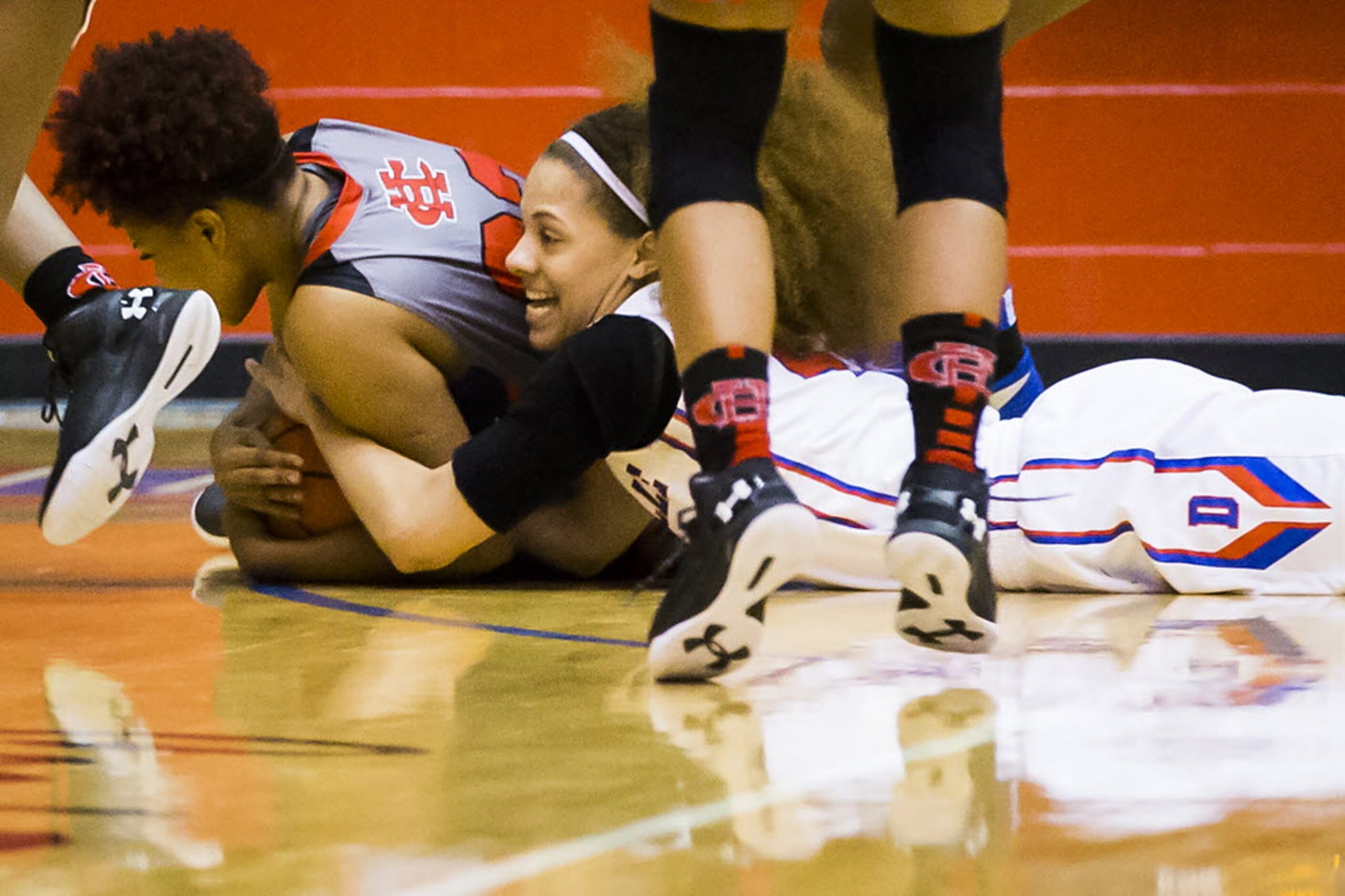 Duncanville forward Madison Townley (41) wrestles with Cedar Hill forward Marie Lester (32)...