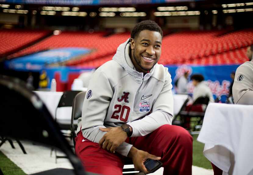 Alabama's Shaun Dion Hamilton attends media day for Saturday's Peach Bowl NCAA college...