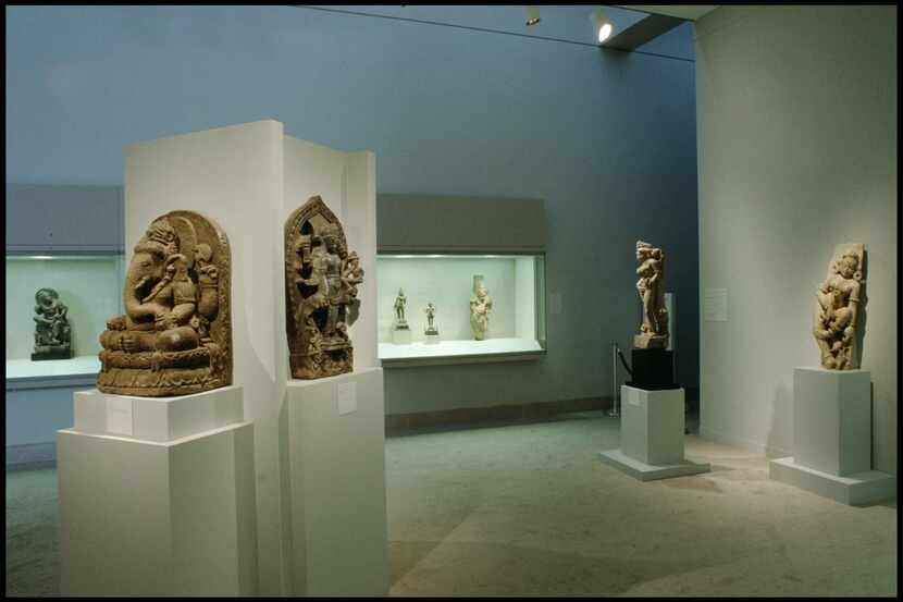 A Lakshmi-Narayana stele from Nepal (foreground, center left) is shown on display in the...