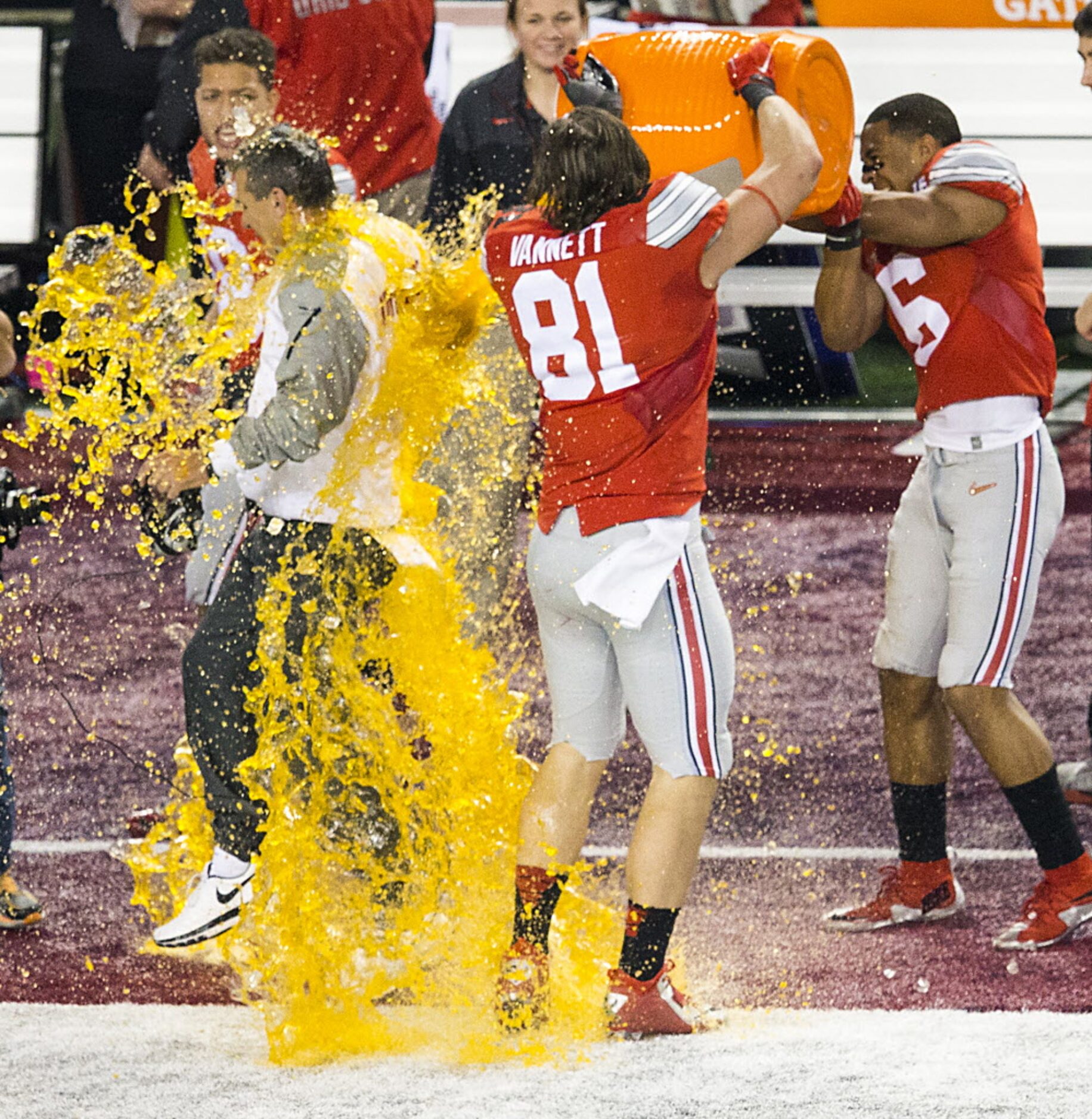 Ohio State Buckeyes head coach Urban Meyer can't escape a Gatorade bath from tight end Nick...