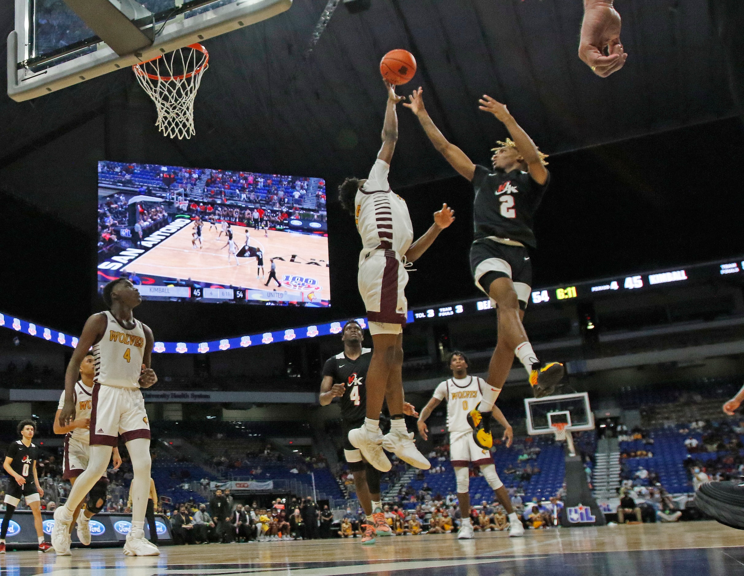 Dallas Kimball Arterio Morris #2 shots over a Beaumont defender. UIL boys Class 5A...