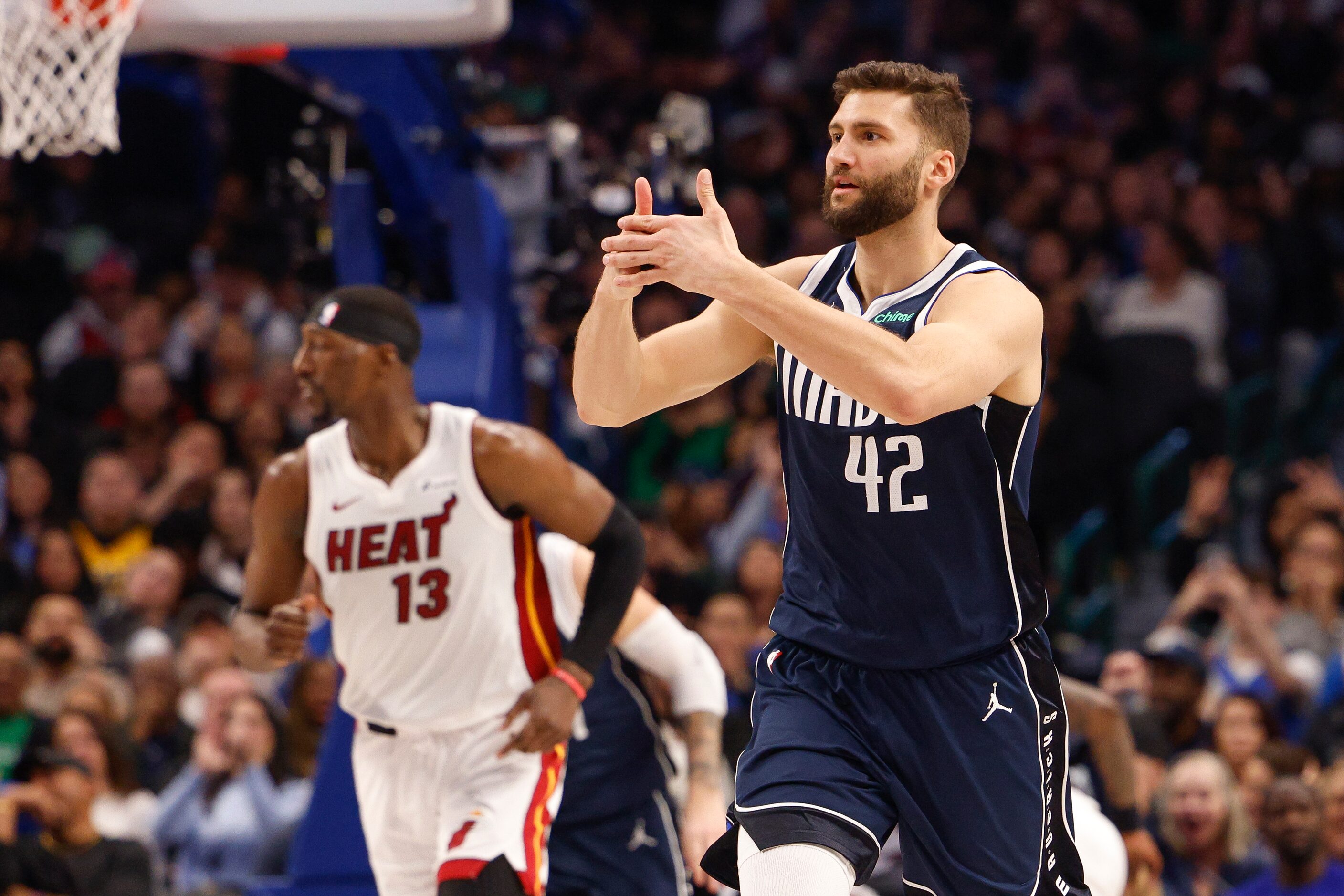 Dallas Mavericks forward Maxi Kleber (42) celebrates after making a three-pointer during the...