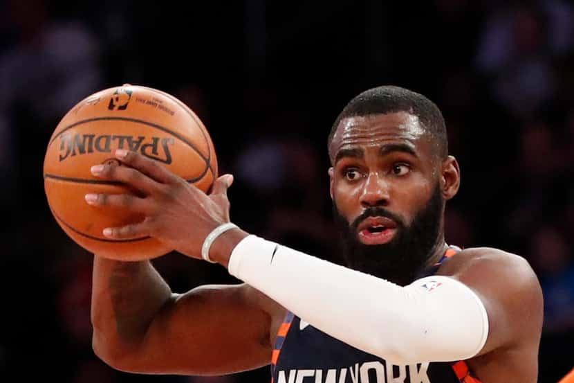 New York Knicks guard Tim Hardaway Jr. looks to pass during the second half of an NBA...