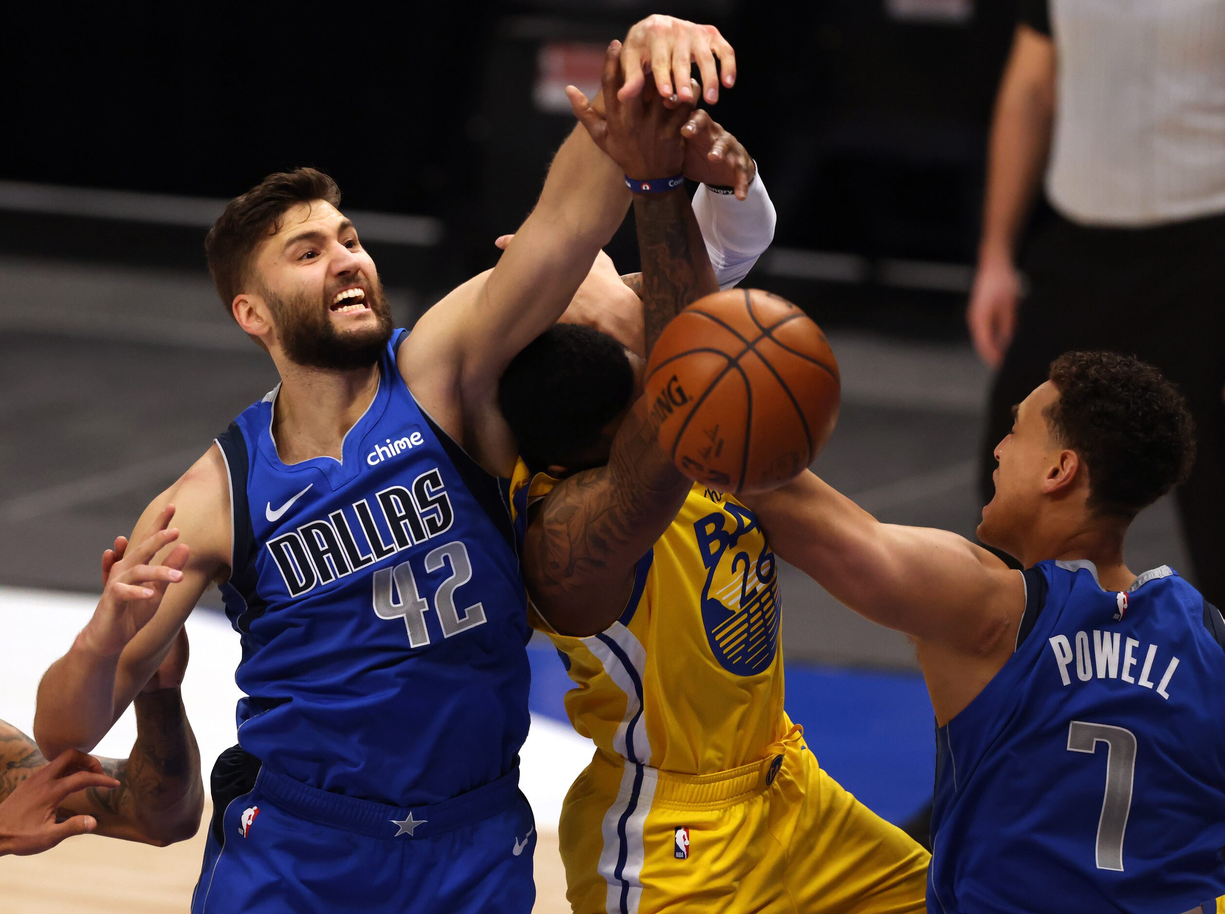 Dallas Mavericks forward Maxi Kleber (42) fouls Golden State Warriors forward Kent Bazemore...