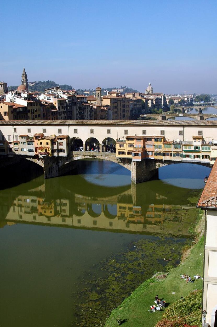 The colorful bridge,  Ponte Vecchio, can be seen from the Uffizi Gallery in Florence.