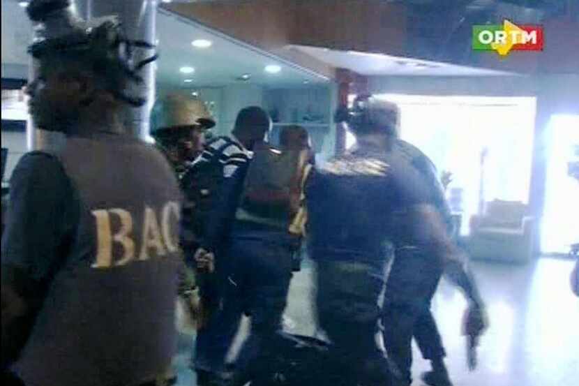 Security forces helped hostages  to safety inside the Radisson Blu in Bamako, Mali, on...