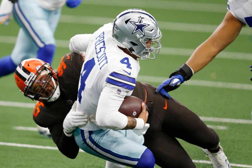 Cleveland Browns defensive end Myles Garrett (95) sacks Dallas Cowboys quarterback Dak...