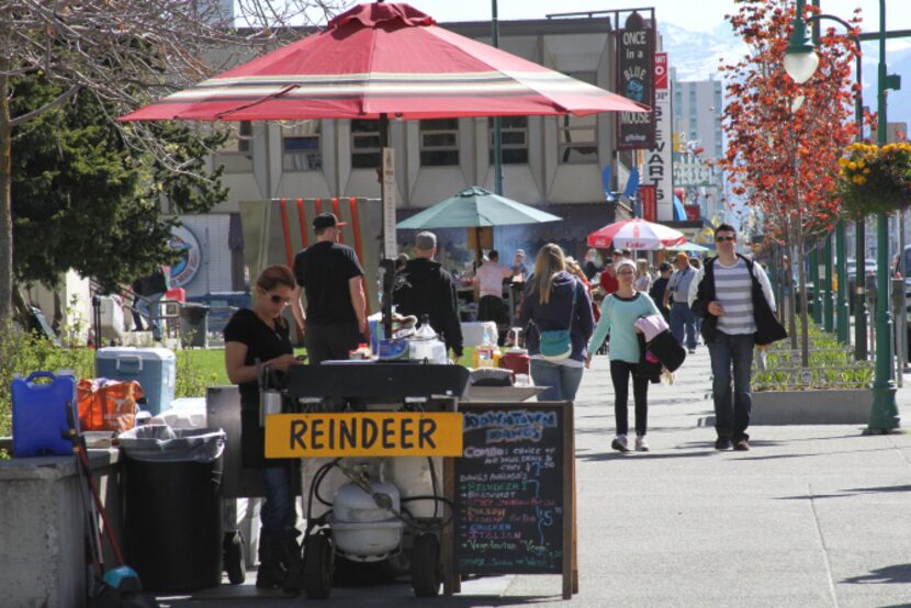 This photo taken June 7, 2013, shows hot dog vendors, or in this case reindeer dog vendors,...