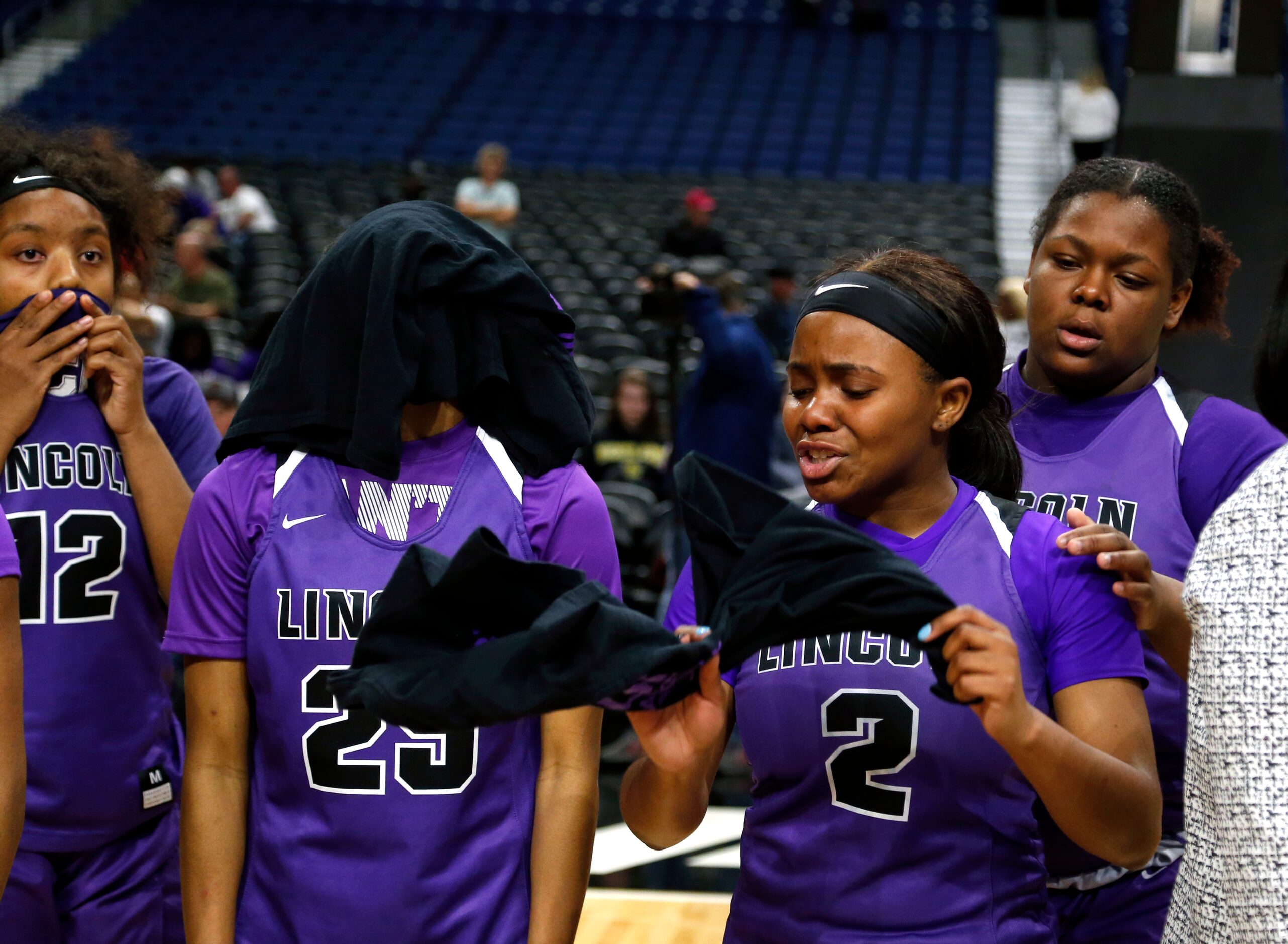 Lincoln guard JaMya Maryland (#2) and center Heaven Johnson (#25) can't hide their...