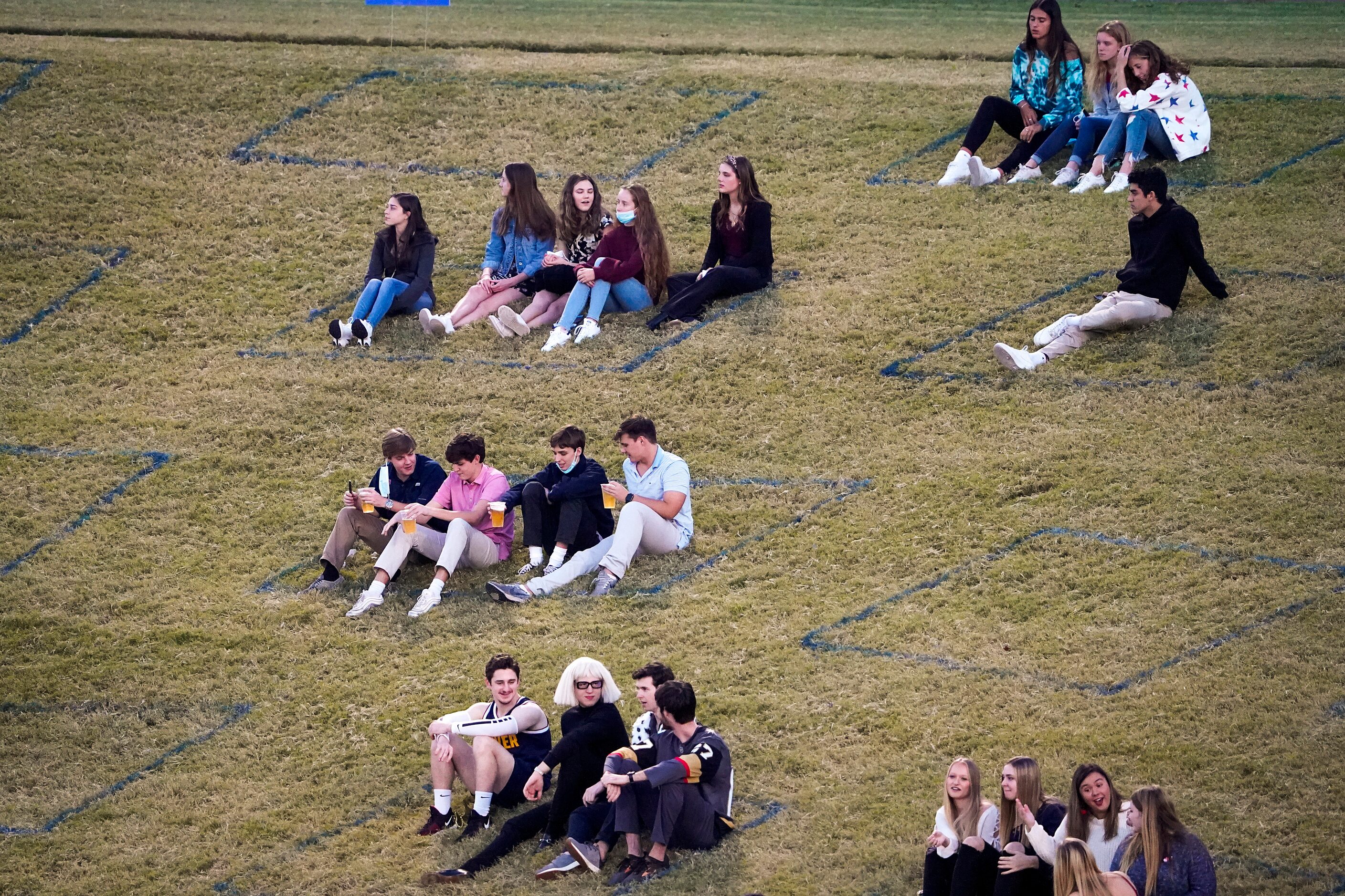 SMU students sit in social distanced sections during the first half of an NCAA football game...